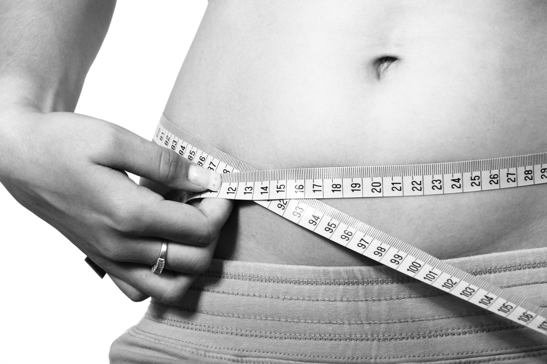 Some measuring their waist.