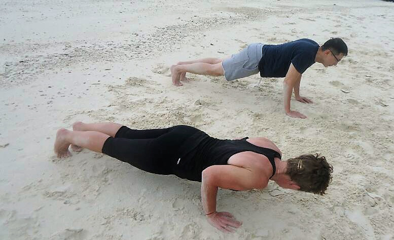 Press ups on the beach